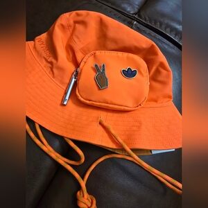 IVY PARK Bright Orange Bucket Hat with Chin Straps